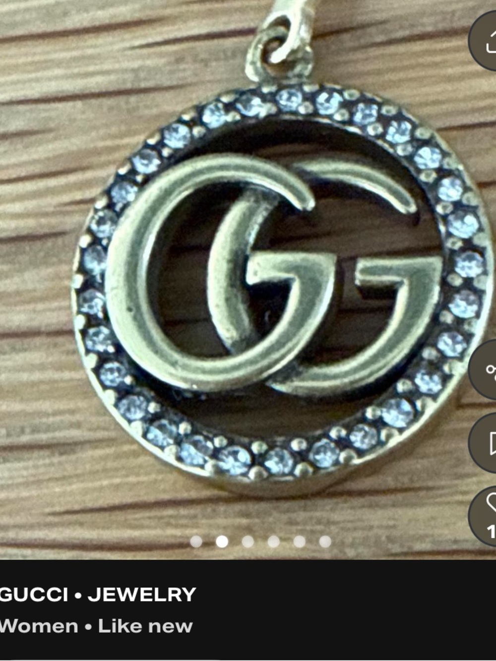 GG logo charm or zipper pull in excellent condition.